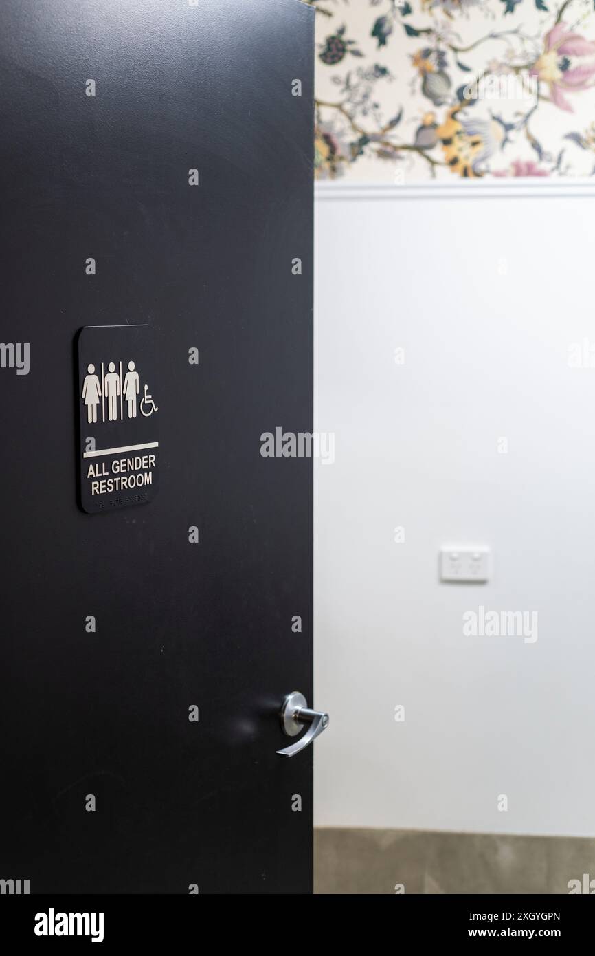 Un bagno per tutti i generi in un ristorante. Foto Stock