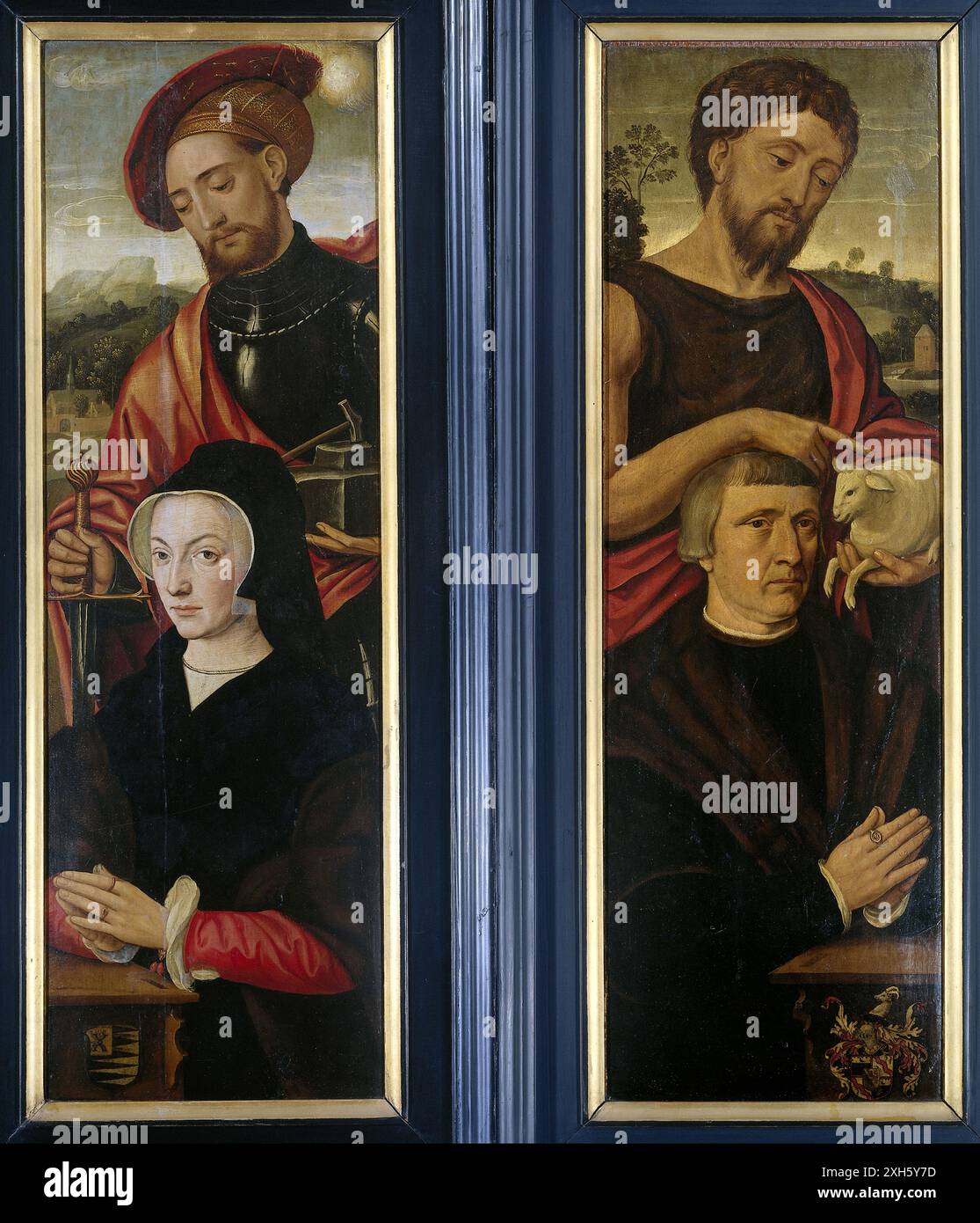 Due ali di un trittico, con i ritratti di un uomo e di una donna, accompagnati rispettivamente da Giovanni Battista e da Sant'Adriano dipinto di Pieter Pourbus Foto Stock