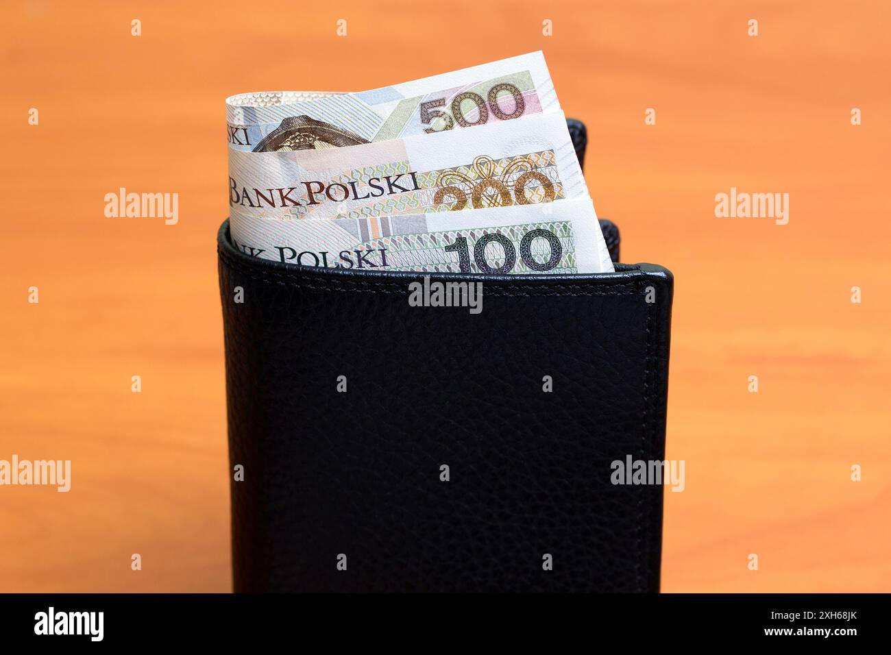 Soldi polacchi - Zloty nel portafoglio nero Foto Stock