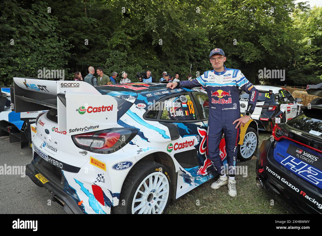 Goodwood, West Sussex, Regno Unito 13 luglio 2024. Gregoire Munster pilota di rally belga al Goodwood Festival of Speed – «Horseless to Hybrid – Revolutions in Power», a Goodwood, West Sussex, Regno Unito. © Malcolm Greig/Alamy Live News Foto Stock