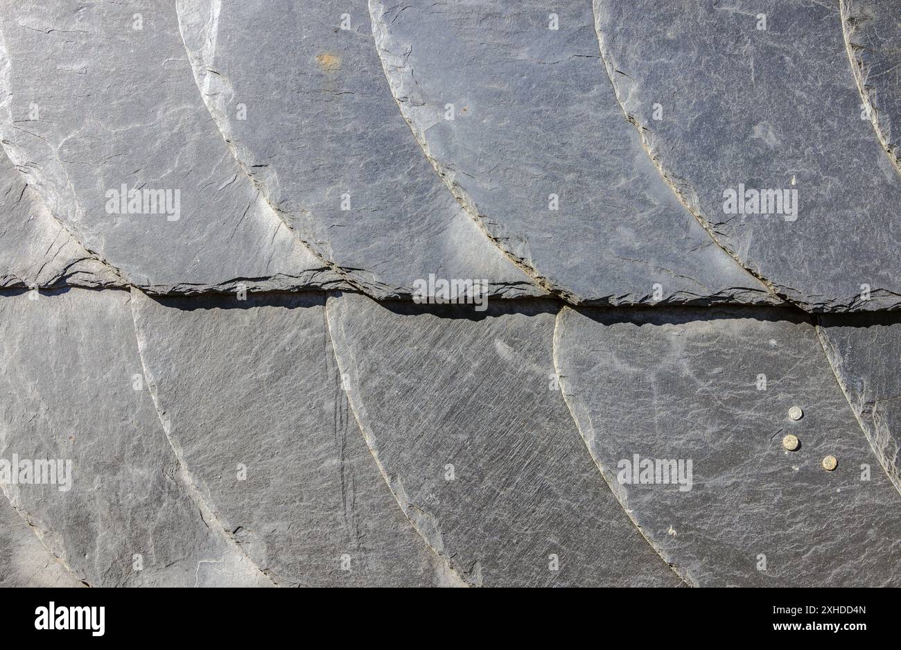 Ardesia sulla facciata in dettaglio come sfondo Foto Stock