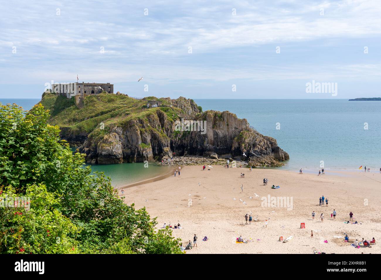 St Catherine's Rock e South Beach, Tenby, Galles occidentale Foto Stock