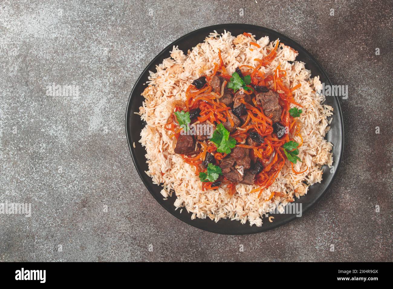 Kabuli pulao, pilaf, il piatto nazionale dell'Afghanistan, riso con carne, fatto in casa, niente gente Foto Stock