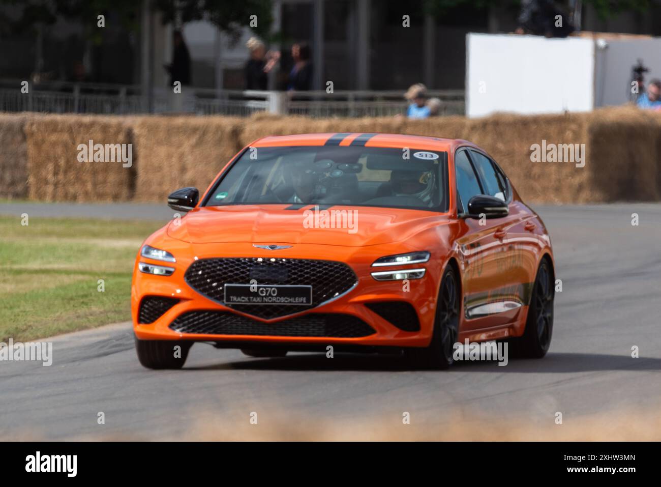 2024 Genesis G70 Track taxi Nordschleife guida in salita sulla pista di salita all'evento Motorsport Goodwood Festival of Speed 2024 nel West Sussex, Regno Unito Foto Stock