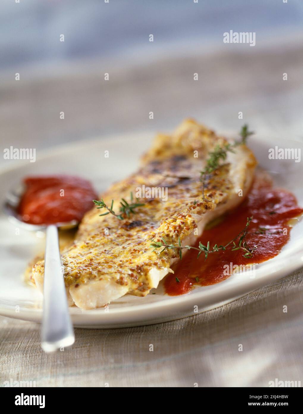 Filetto di John Dory con senape tradizionale Foto Stock