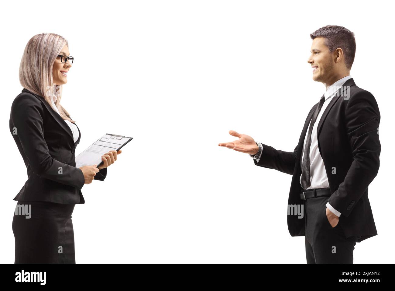 Foto del profilo di un uomo e di una donna professionisti che hanno una conversazione al lavoro isolata su sfondo bianco Foto Stock