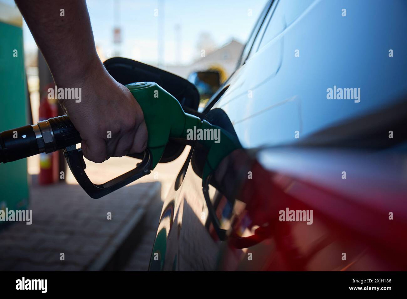 Ugello stazione di rifornimento serbatoio auto Foto Stock
