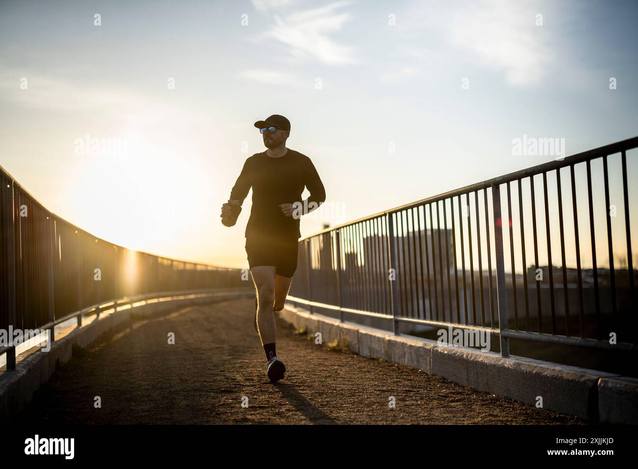 Trail running maschile a metà degli anni '20. Foto Stock