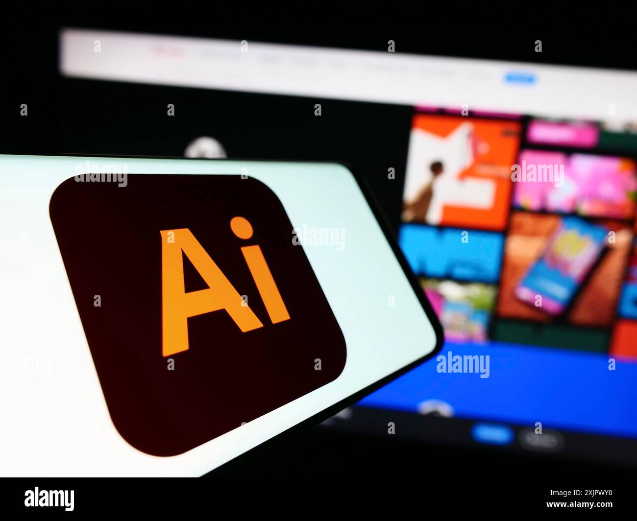 Stoccarda, Germania, 09-23-2023: Smartphone con logo dell'editor di grafica vettoriale Adobe Illustrator sullo schermo davanti al sito Web dell'azienda. Concentrati su Foto Stock