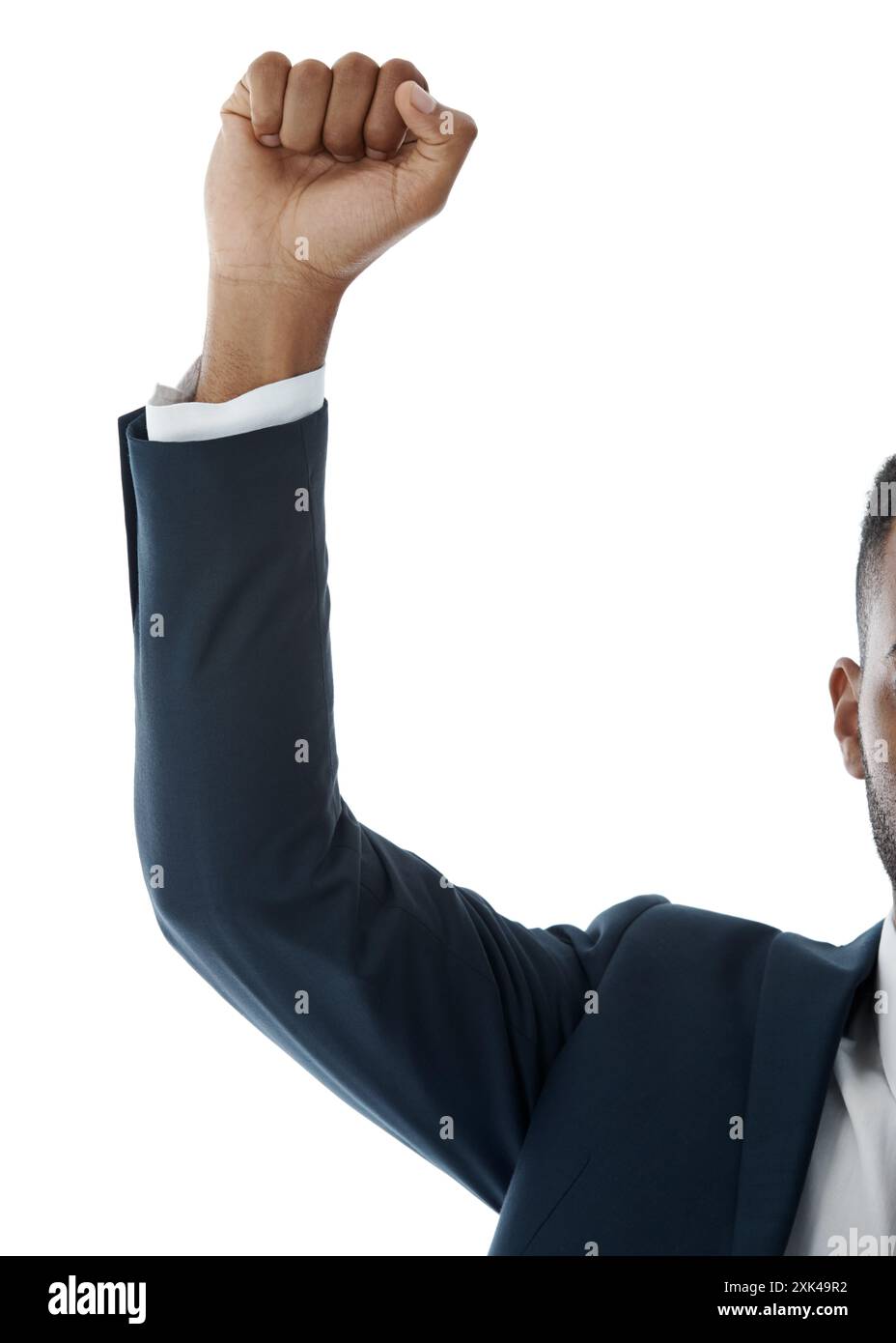 Business, mano e uomo con pugno in aria, dipendente e modello isolati su sfondo bianco studio. Primo piano, professionale aziendale o finanziario Foto Stock