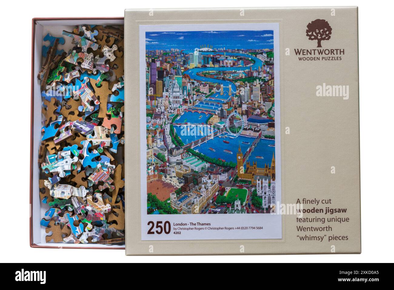 Scatola di puzzle in legno di Wentworth contenente pezzi di puzzle con coperchio spento - un seghetto in legno finemente tagliato con pezzi originali di Wentworth Foto Stock
