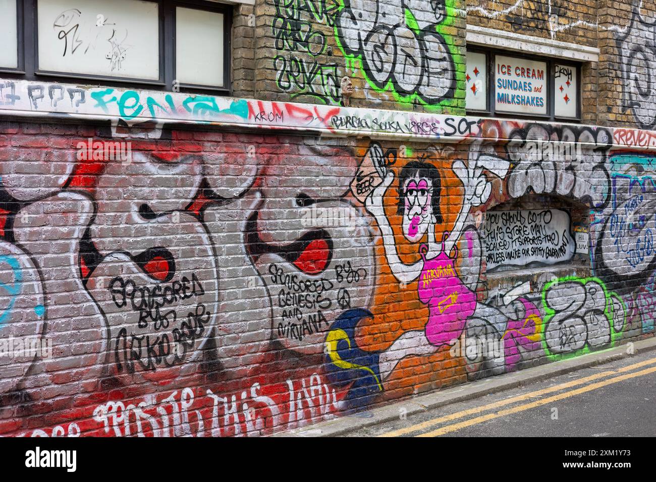 Muraglia di graffiti Buxton Street, Spitalfields, Londra Foto Stock