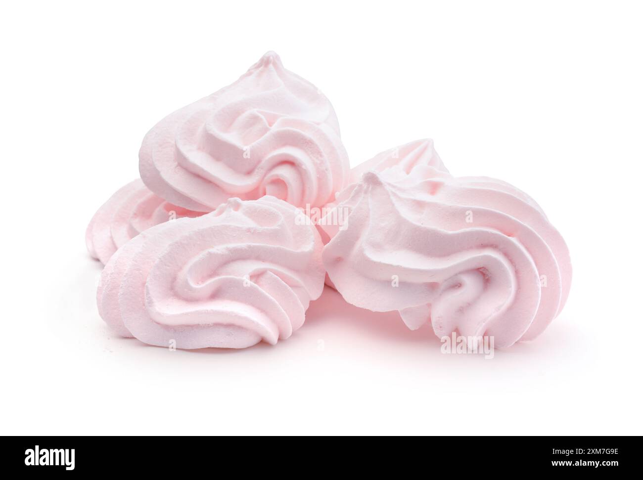 Diverse meringhe rosa fresche isolate su bianco. Foto Stock