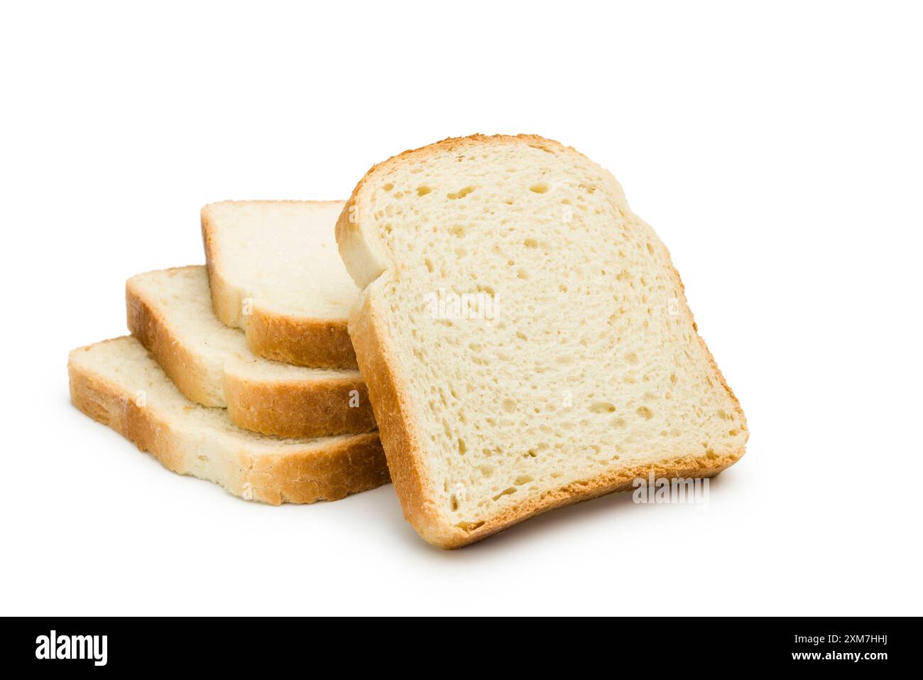 Fette di pane bianco isolate su sfondo bianco. Foto Stock