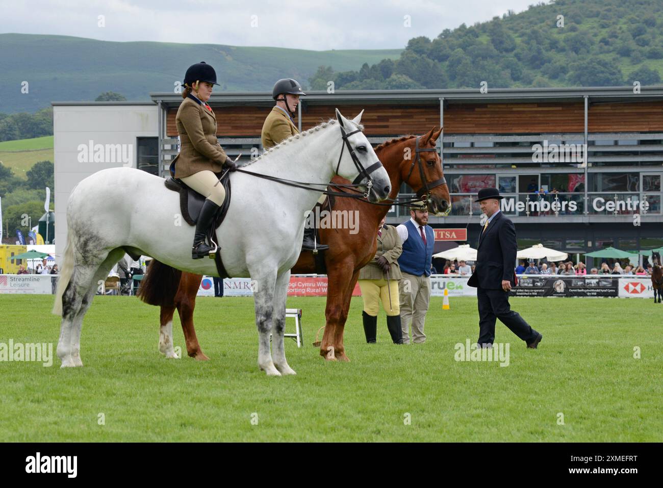 Persone che competono in eventi equestri al Royal Welsh Show, Builth Wells, luglio 2024 Foto Stock