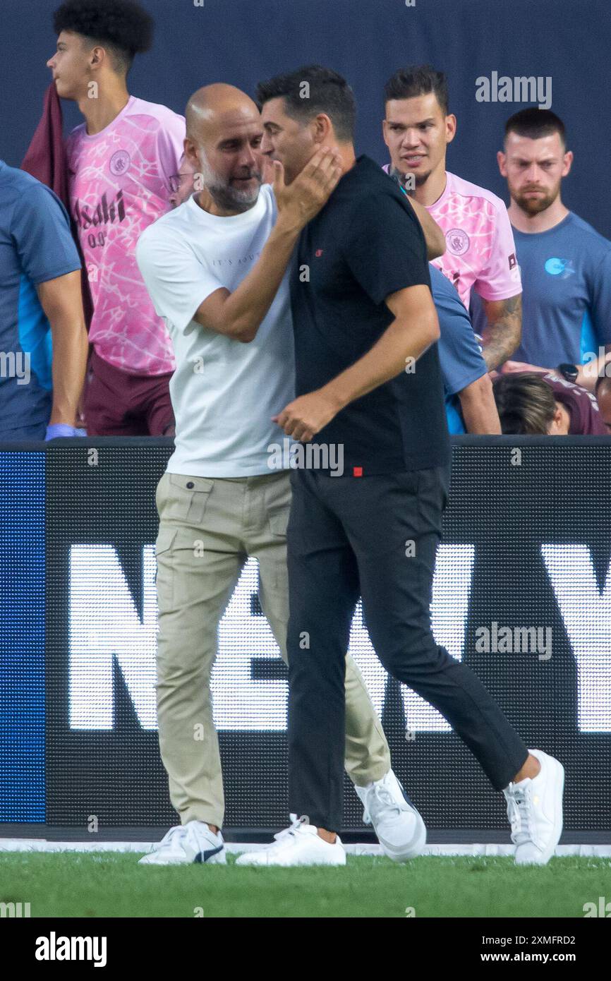 New York, Stati Uniti. 27 luglio 2024. PEP Guardiola di Manchester City e Paulo Fonseca di Milano in un'amichevole internazionale allo Yankee Stadium di New York negli Stati Uniti questo sabato, 27 luglio. Crediti: Brasile Photo Press/Alamy Live News Foto Stock