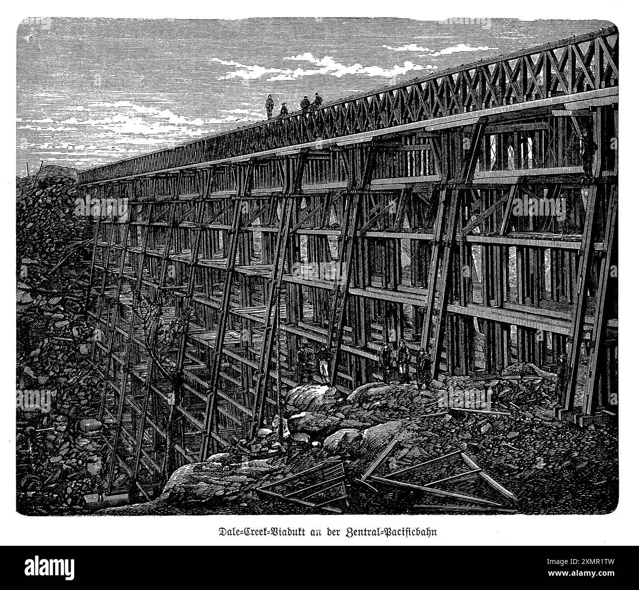 Questa incisione raffigura il Dale Creek Crossing, un notevole ponte in legno costruito nel 1860 come parte della Union Pacific Railroad. Attraversato il profondo Dale Creek Canyon nel Wyoming, questo ponte fu un elemento cruciale della prima ferrovia transcontinentale. L'intricato reticolo di travi di legno, che torreggia sopra l'aspro paesaggio, esemplifica l'ingegnosità e l'audacia dell'ingegneria del XIX secolo. Questa struttura, con la sua altezza e lunghezza impressionanti, mostra le sfide e i trionfi della costruzione di una ferrovia attraverso il terreno duro del West americano. Foto Stock