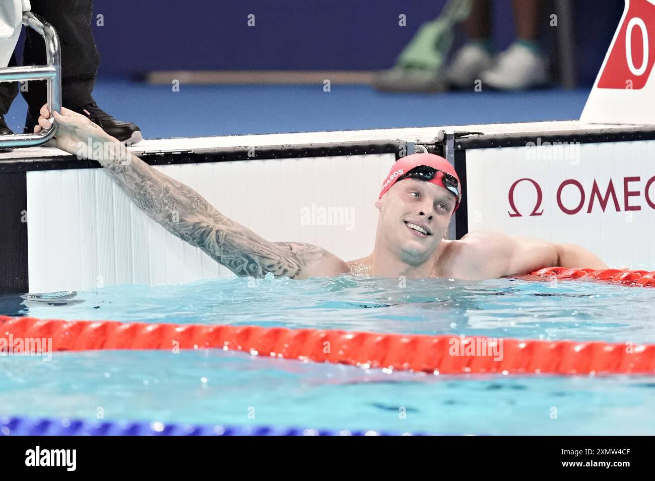 Parigi, Francia. 29 luglio 2024. Matthew Richards del Regno Unito reagisce dopo aver vinto la medaglia d'argento nella finale maschile 200m Freestyle alle Olimpiadi di Parigi 2024 all'Arena le Defense di Parigi, Francia, lunedì 29 luglio 2024. David Popovichi della Romania ha vinto l'oro, Matthew Richards del Regno Unito ha vinto l'argento e Luke Hobson degli Stati Uniti ha vinto il bronzo. Foto di Richard Ellis/UPI credito: UPI/Alamy Live News Foto Stock
