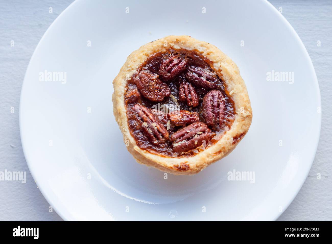 Crostata di noci pecan al burro, un popolare dessert canadese Foto Stock