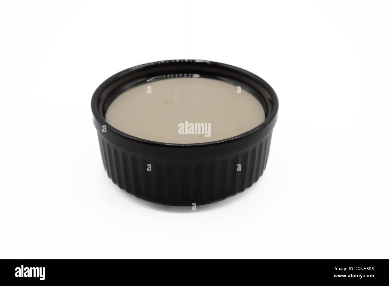 Mogel Kogel in una ciotola. Il mogel Kogel è un dessert cremoso fatto in casa, composto da tuorli d'uovo e zucchero. Foto Stock