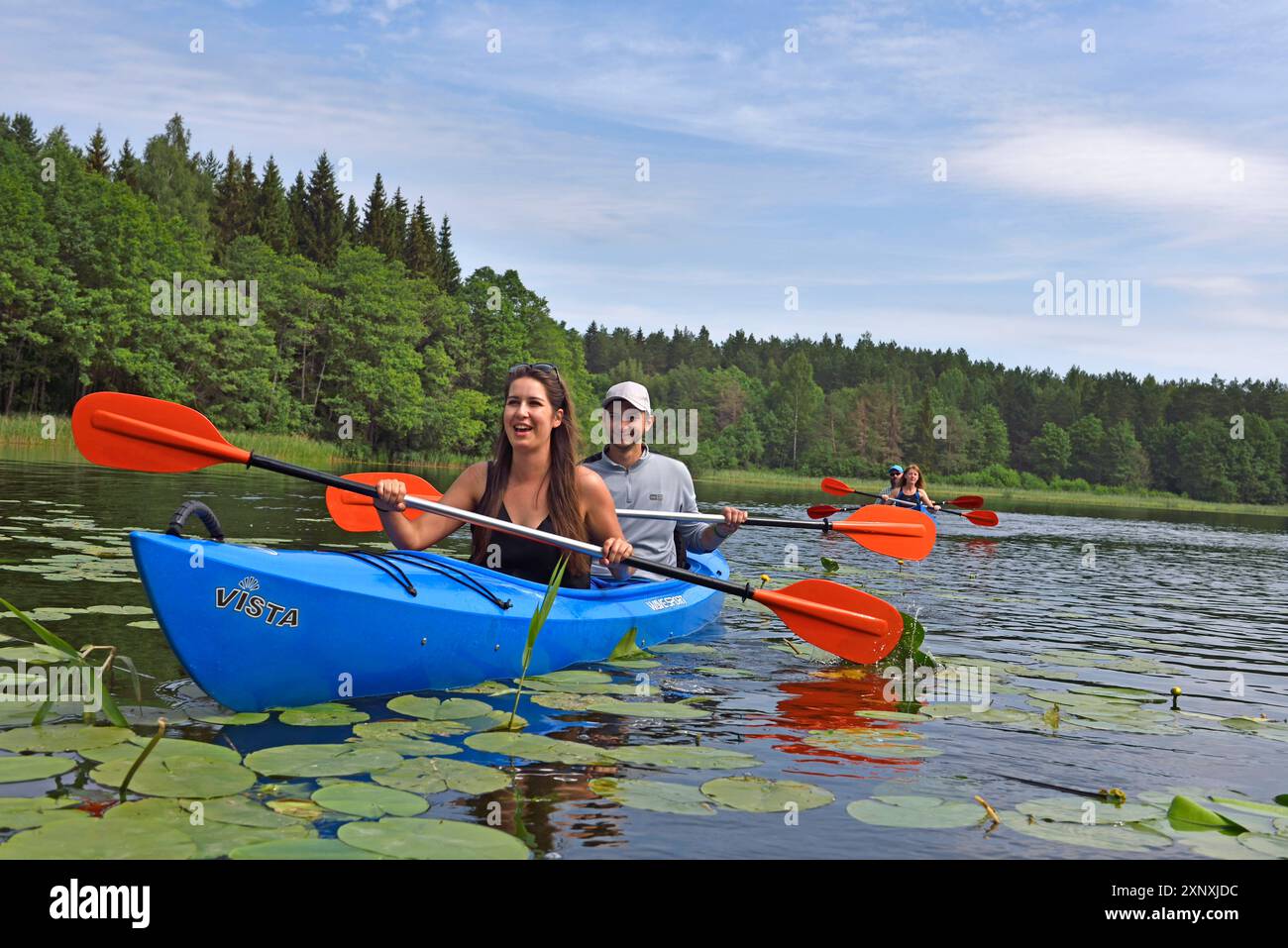 Gita in canoa sul lago Baluosykstis intorno a Ginuciai, Parco Nazionale Aukstaitija, Lituania, Europa Copyright: GOUPIxCHRISTIAN 1382-189 Foto Stock