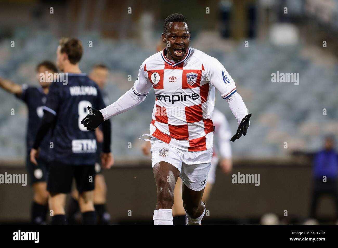 CANBERRA, AUSTRALIA - LUGLIO 30: Phakedi manda degli o'Connor Knights celebra il suo gol durante l'Australia Cup Round of 32 match action tra o'Conno Foto Stock
