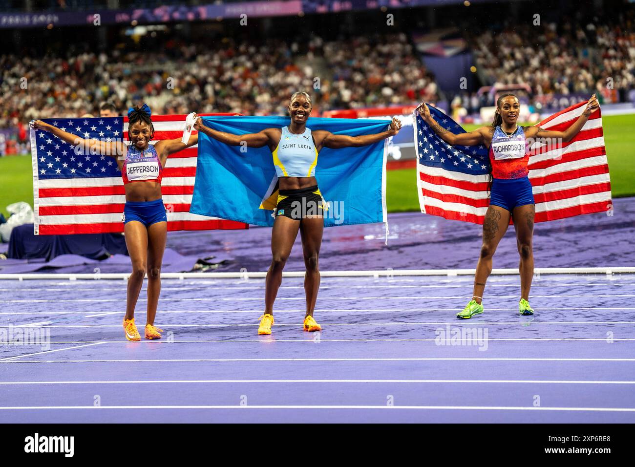 Julien Alfred (LCA) Womens 100m Final, medaglia d'oro con SHa'carri Richardson (USA) R Silver e Melissa Jefferson (USA) bronzo, alle Olimpiadi del 2024 Foto Stock