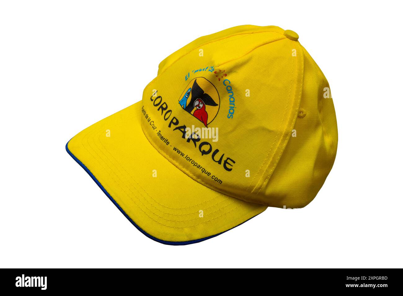 El Must de Canarias loro Parque Puerto de la Cruz cappellino giallo da baseball Tenerife isolato su sfondo bianco Foto Stock