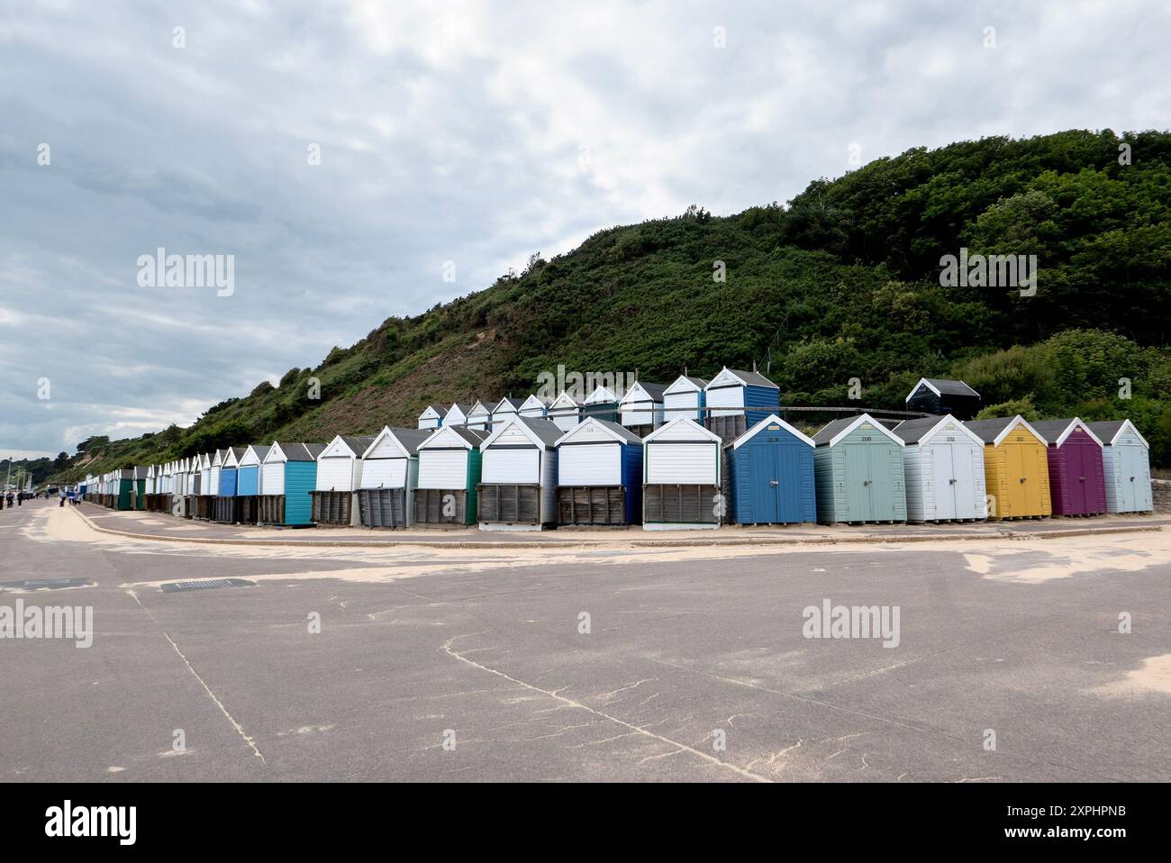 Colorate capanne sulla spiaggia di Durley Chine Beach, Bournemouth Foto Stock