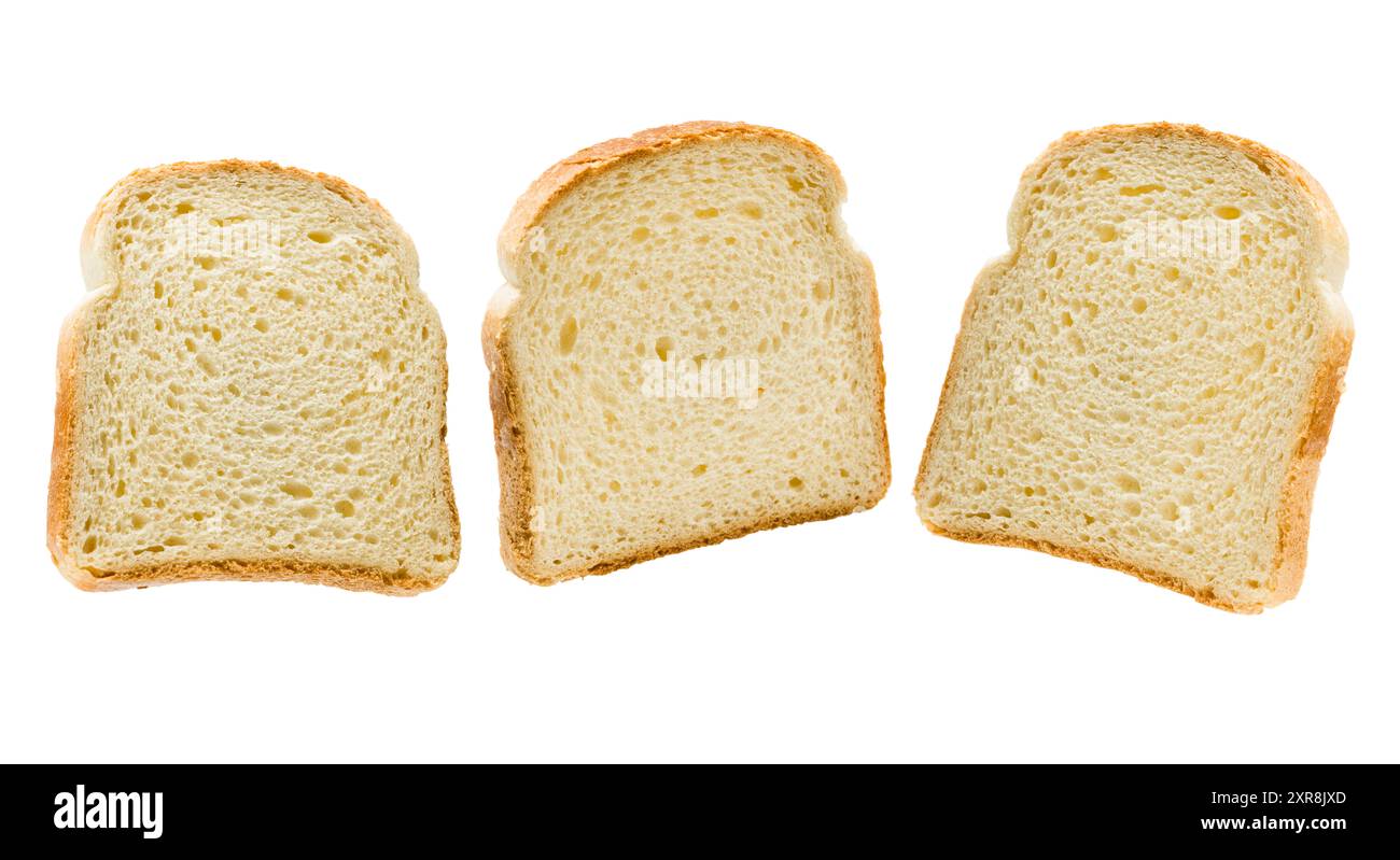 Fette di pane bianco isolate su sfondo bianco. Foto Stock