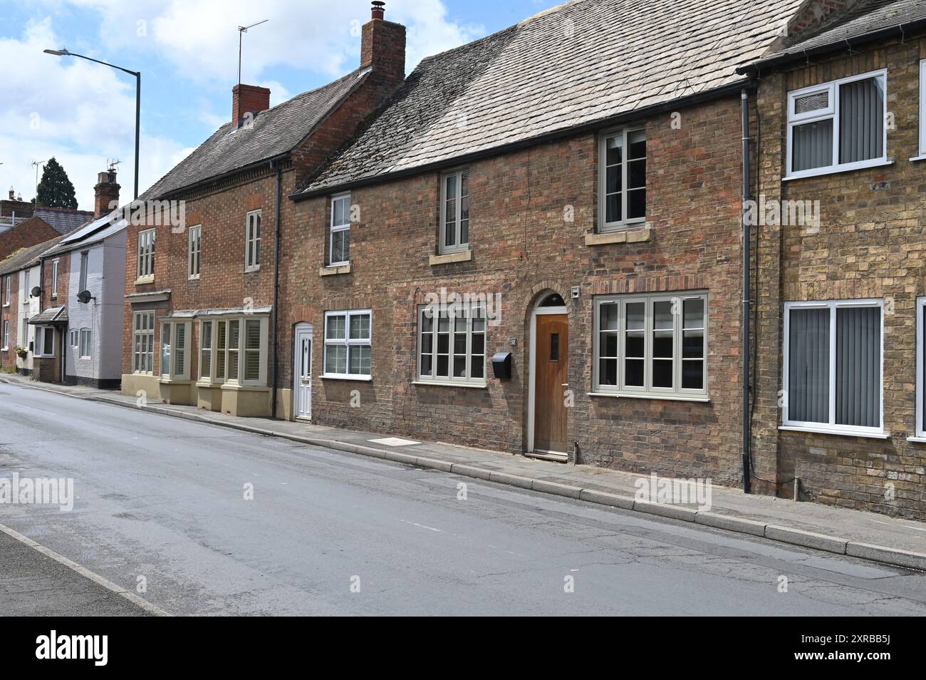 Case bult in mattoni terrazzati a Shipston, a Stour, nel Warwickshire Foto Stock