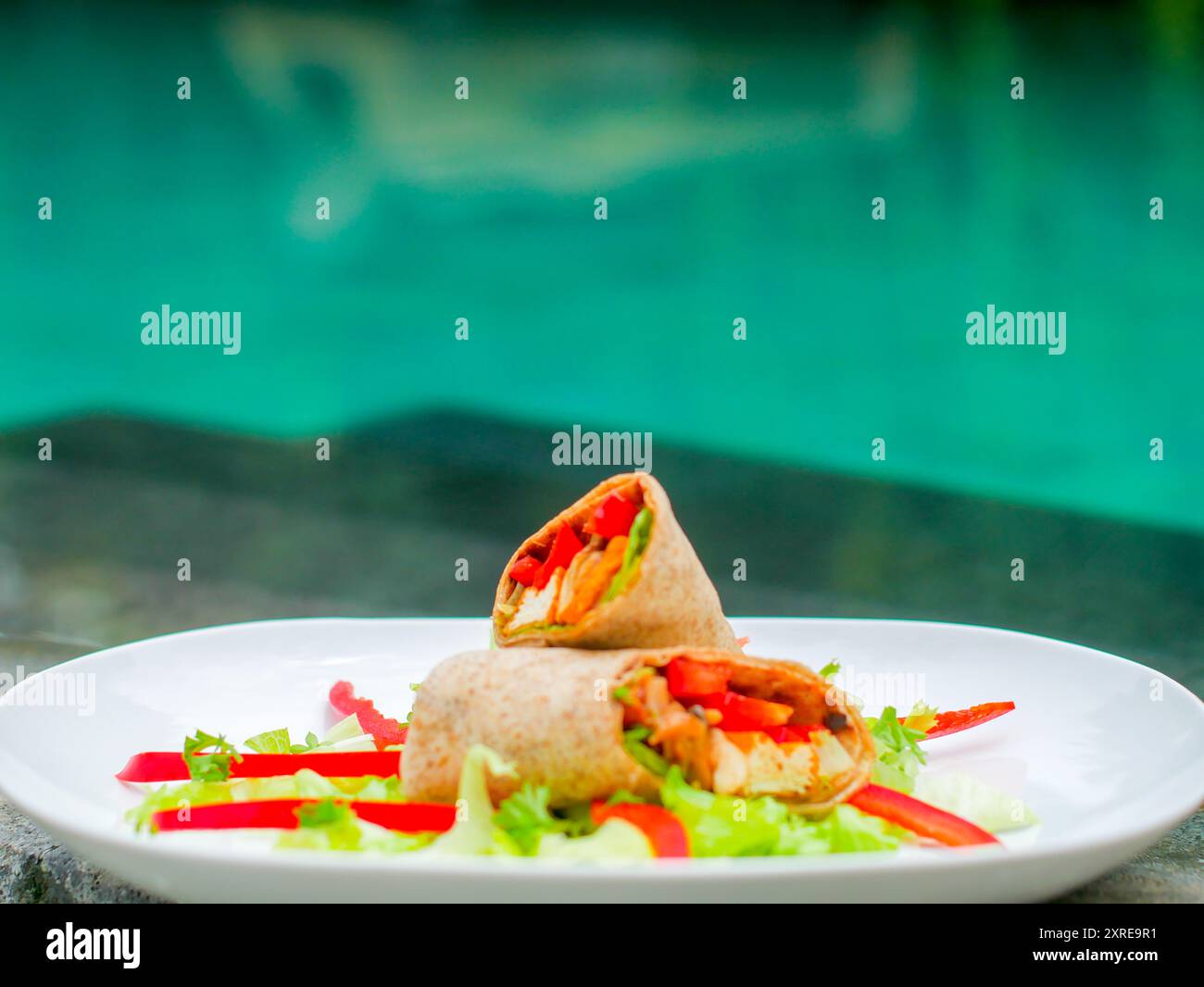 cena con burrito vegano Foto Stock