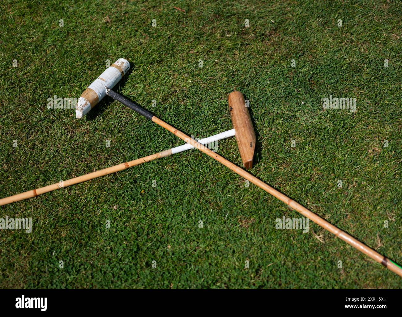 Mazzuole di polo a terra in occasione di un evento di polo. Foto Stock