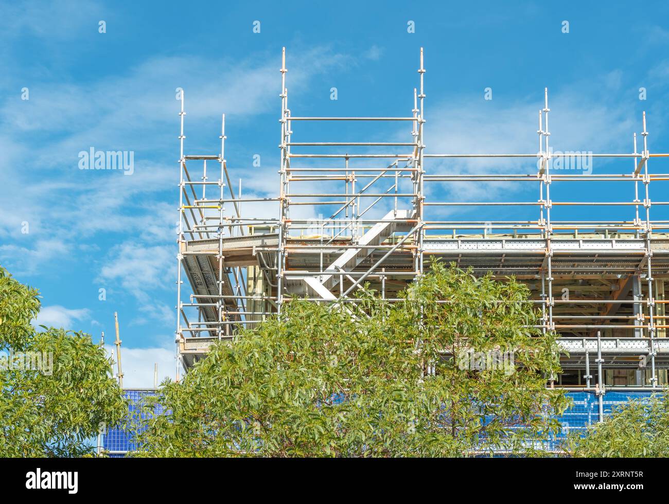 ponteggi eretti su un cantiere edile norme di salute e sicurezza, Foto Stock