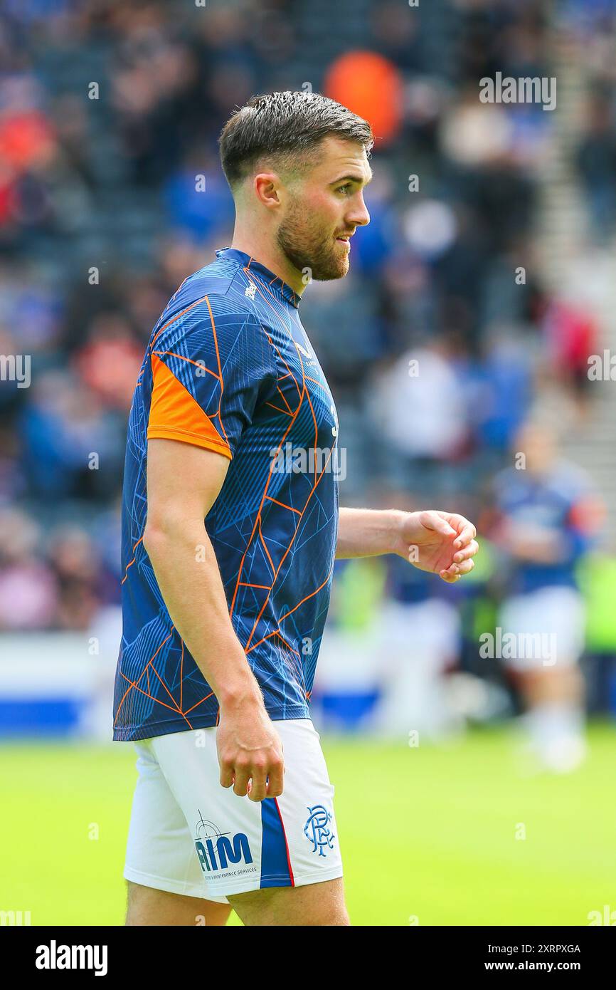 JOHN SOUTTAR, giocatore di football professionistico, attualmente gioca per i Rangers. Durante una sessione di allenamento e riscaldamento pre-partita. Foto Stock