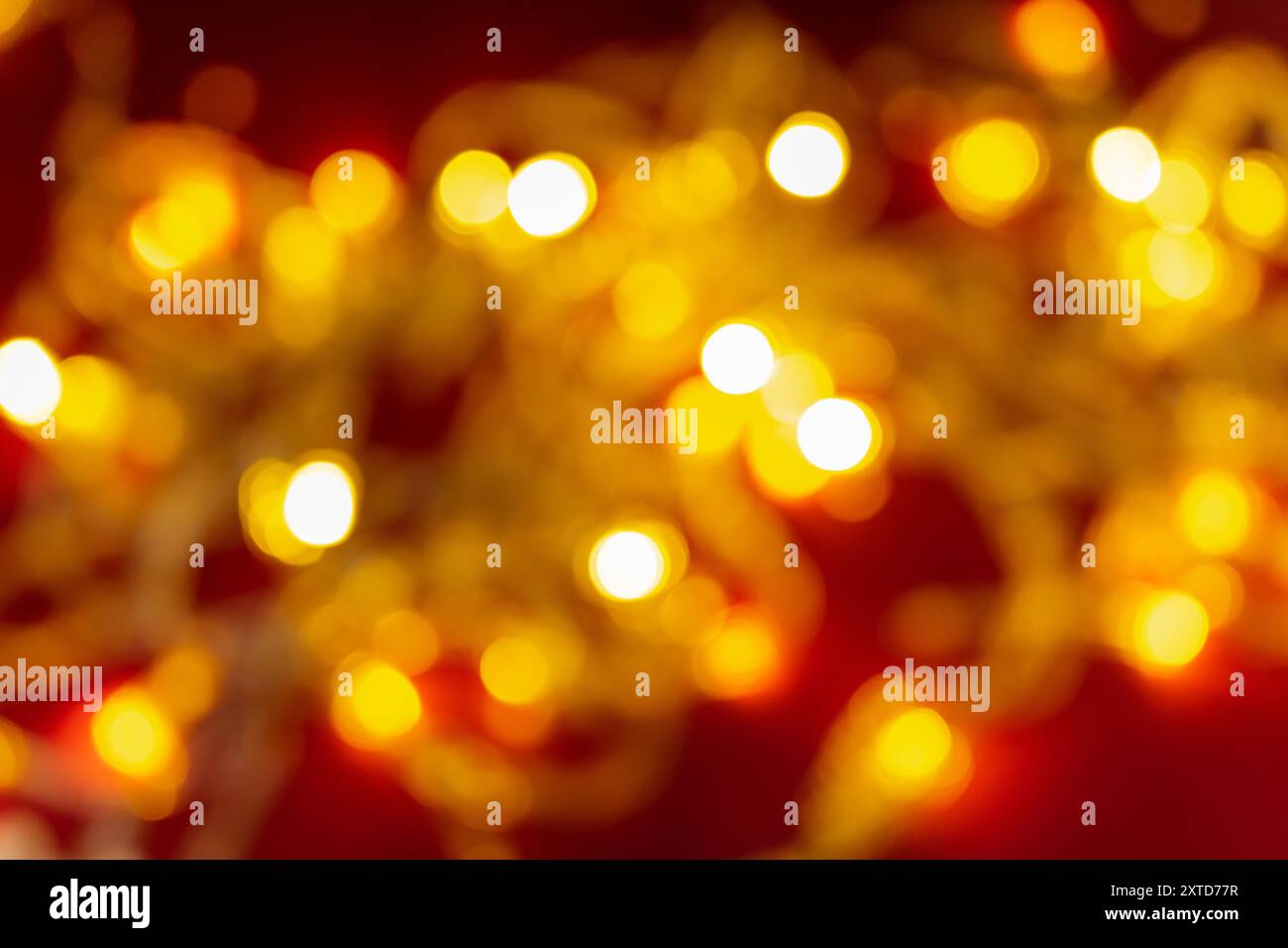 Sfondo sfocato luminoso con bokeh natalizio. Foto Stock