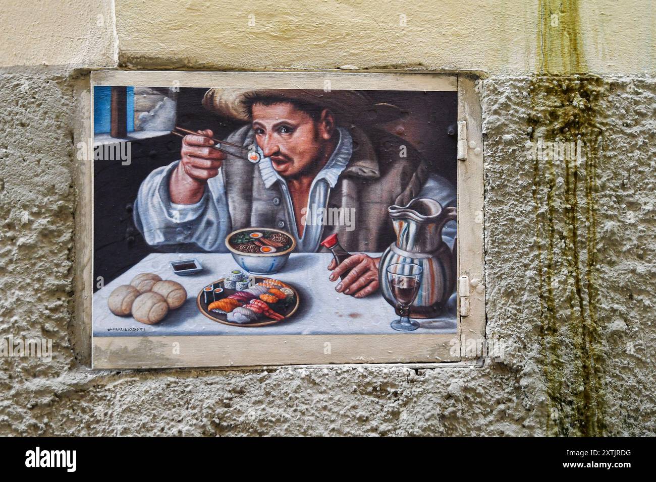 Il Beaneater (Annibale Carracci) diventa il Sushieater dello Street artist Maurizio Rapiti su un muro nell'Oltrarno, Firenze, Toscana, Italia Foto Stock