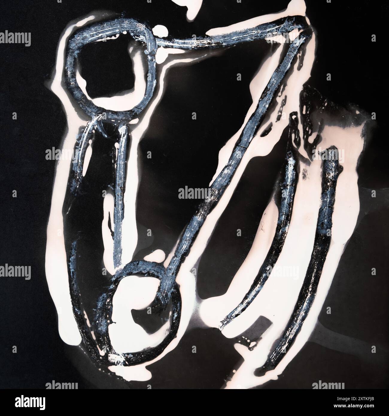 Chemigramma concettuale in formato quadrato astratto che suggerisce che l'orientamento di un'immagine è un concetto puramente arbitrario, surrealista. Foto Stock