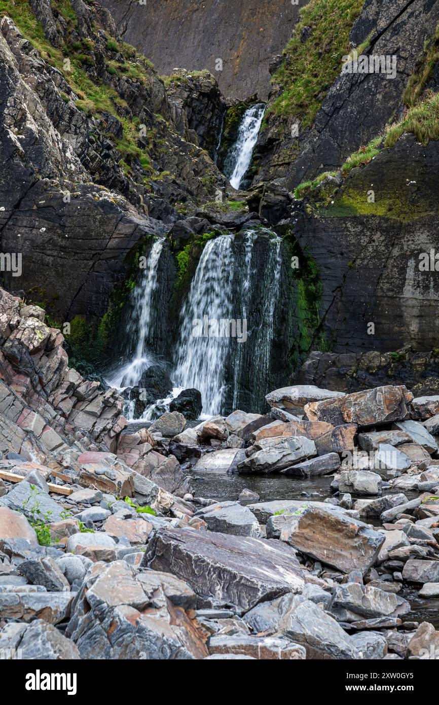 Cascata Spekes Mill Mouth sulla penisola di Hartland, a nord-ovest del Devon, Inghilterra occidentale, Regno Unito Foto Stock