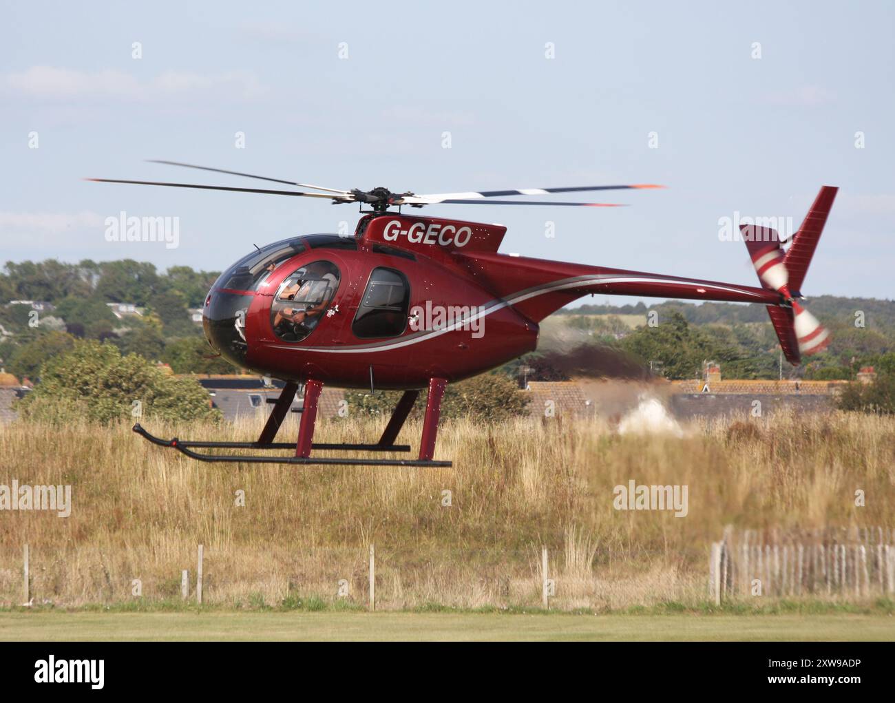 Un elicottero Hughes 369HS all'Aeroporto di Brighton City Foto Stock