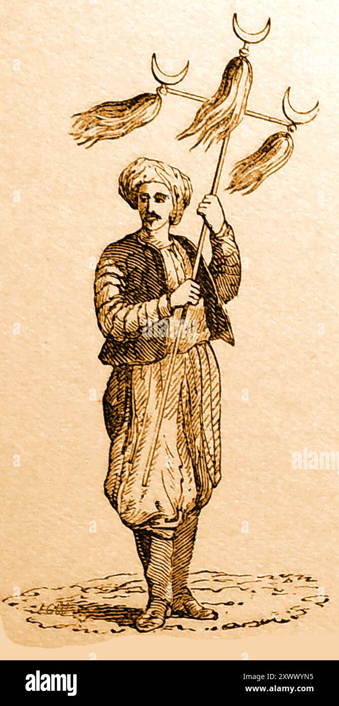Un'illustrazione del XIX secolo di uno standard di coda di cavallo pascià con 3 code che indicano lo stato. Era anche conosciuto come uno standard ottomano o "Tugh" che ebbe origine tra i nomadi dell'Asia centrale , dai Mongoli e dai Turchi e veniva solitamente fatto da un fascio di capelli di cavallo o yak (nero, bianco o colorato) fissati su un bastone di legno, sormontato da una finitura metallica. - Statü belirten 3 kuyruklu bir Paşa at kuyruğu sancağının 19. yüzyıla ait bir illüstrasyonu. Orta Asya göçebeleri, Moğollar ve Türkler arasında ortaya çıkan Osmanlı sancağı veya “Tuğ” olarak da bilinirdi. Foto Stock