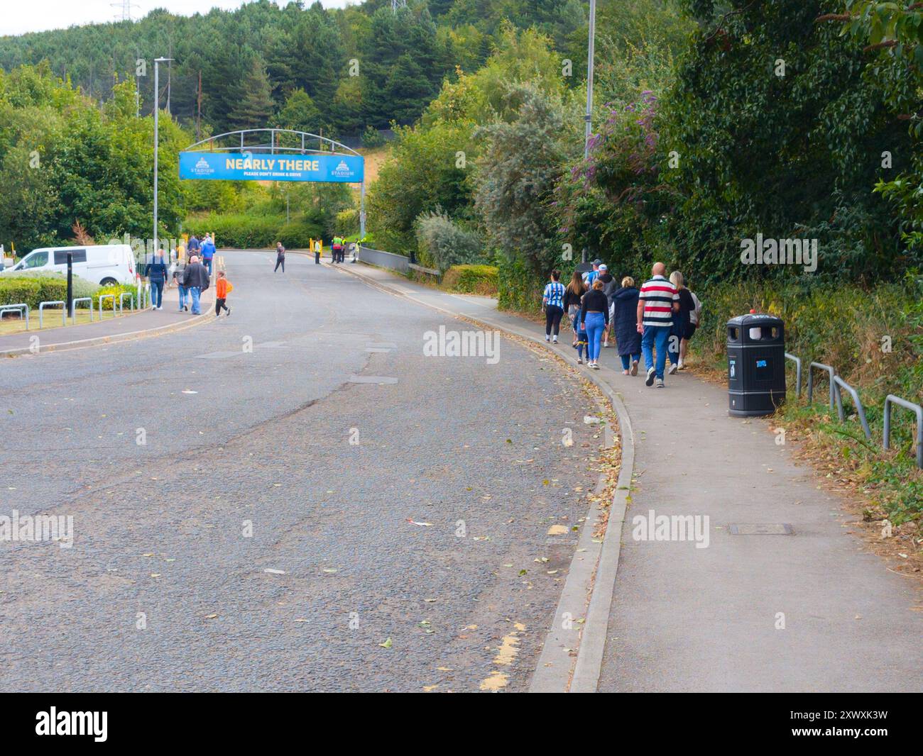 Andare a una partita di football Foto Stock