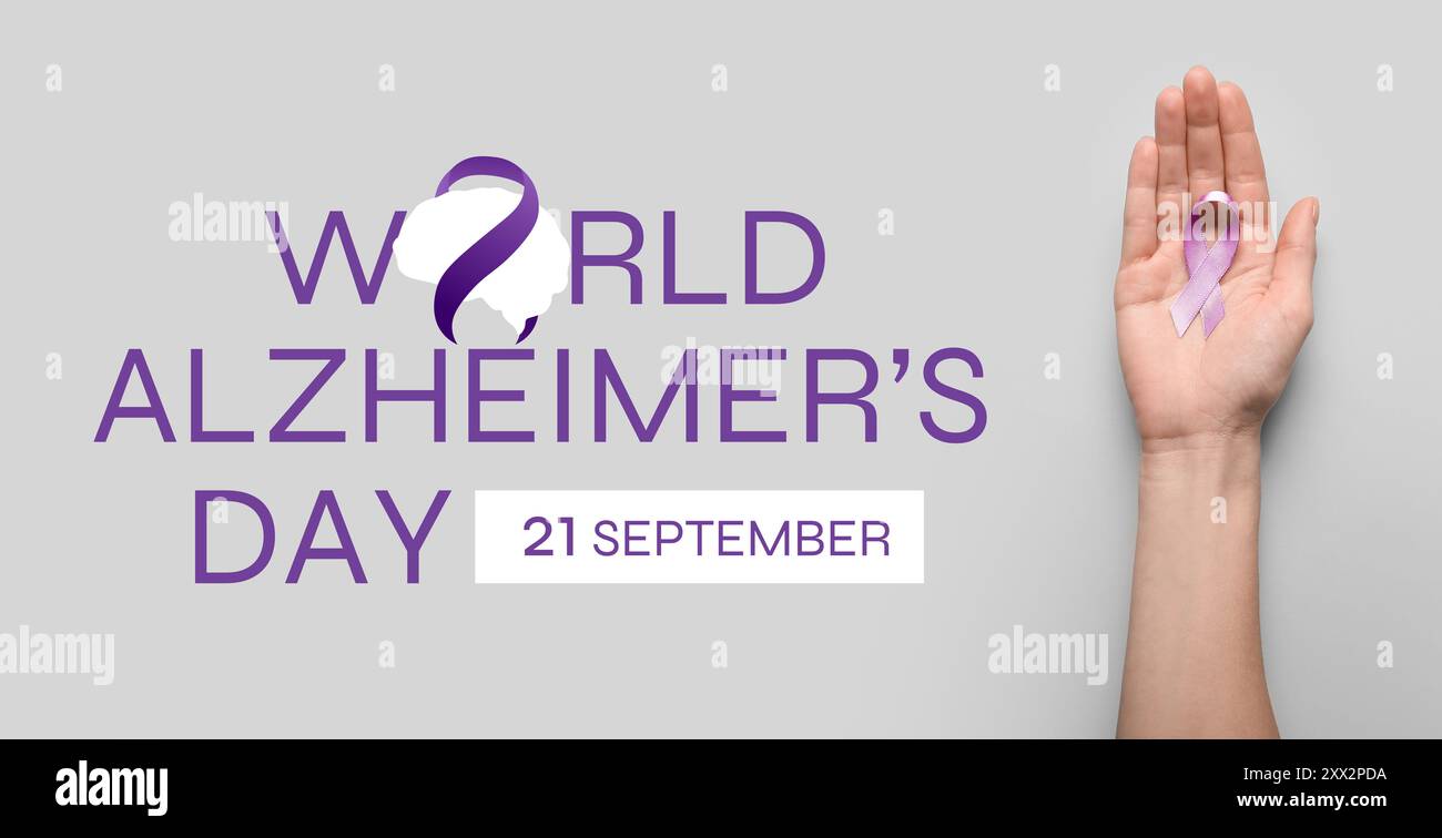 Striscione per la giornata Mondiale dell'Alzheimer con nastro di sensibilizzazione Foto Stock