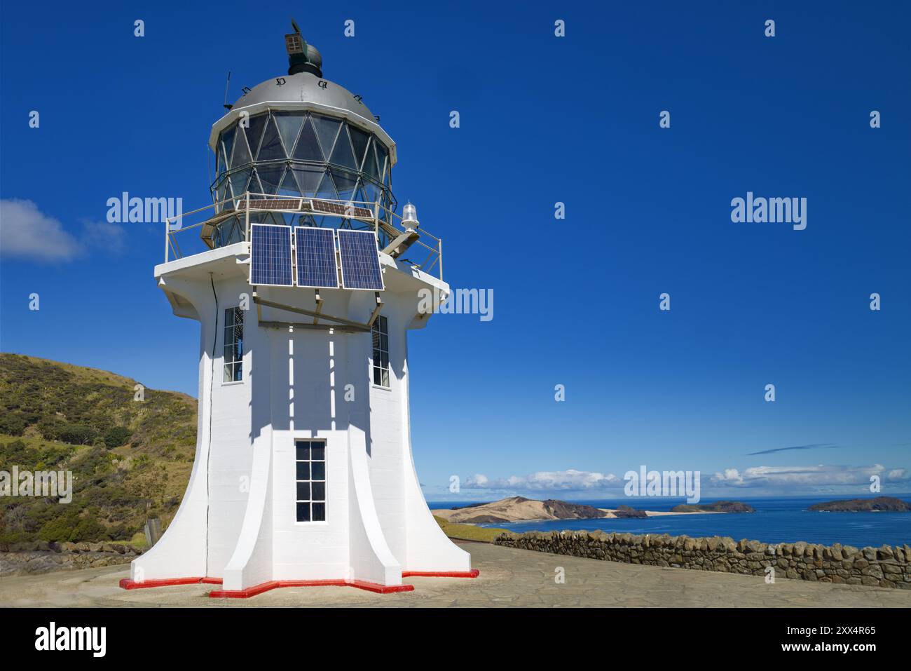 Faro di Cape Reinga sulla punta più a nord dell'Isola del Nord, nuova Zelanda. Foto Stock