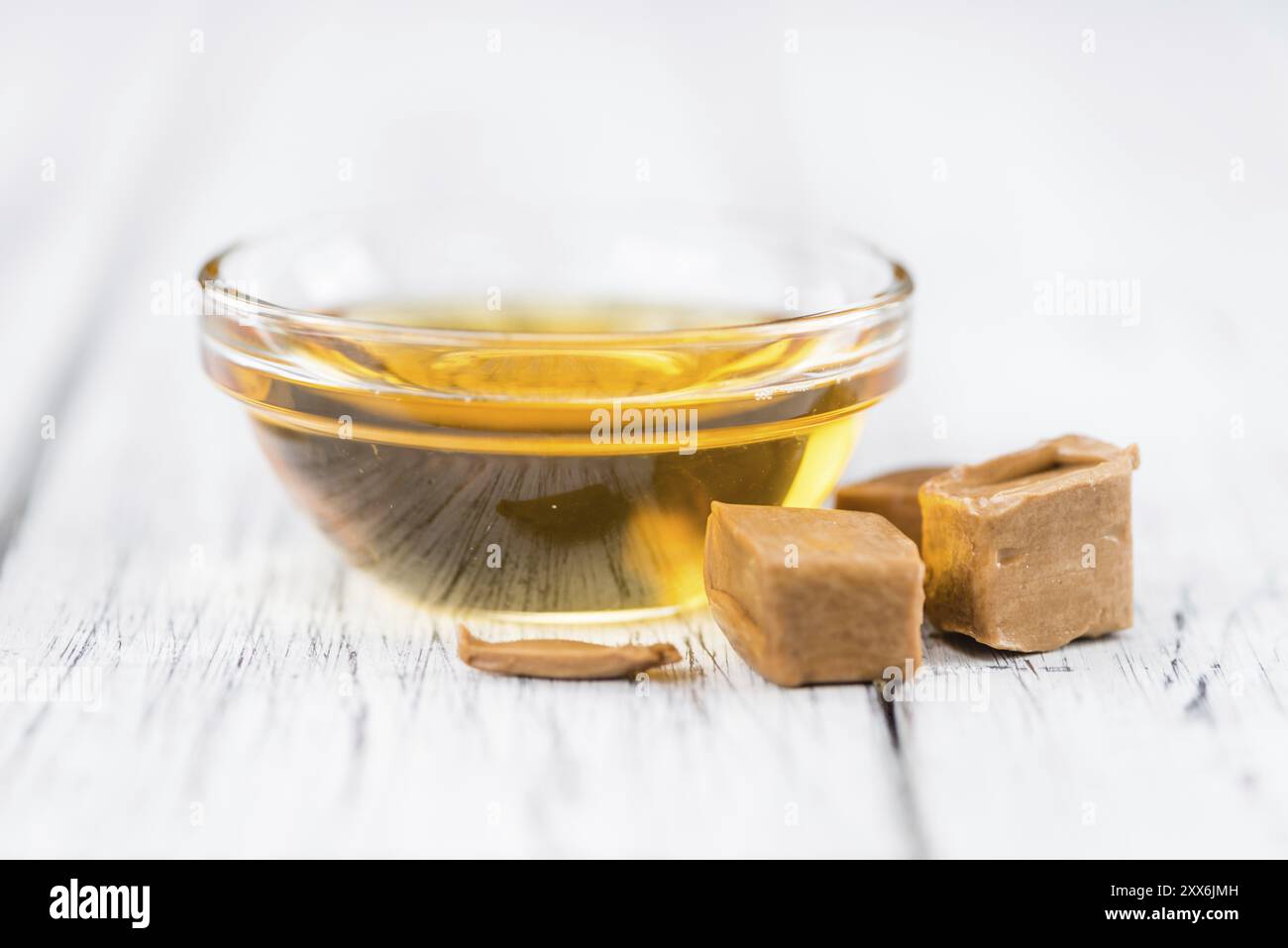 Caramello Sirup su un sfondo vintage come dettagliato di close-up shot (messa a fuoco selettiva) Foto Stock