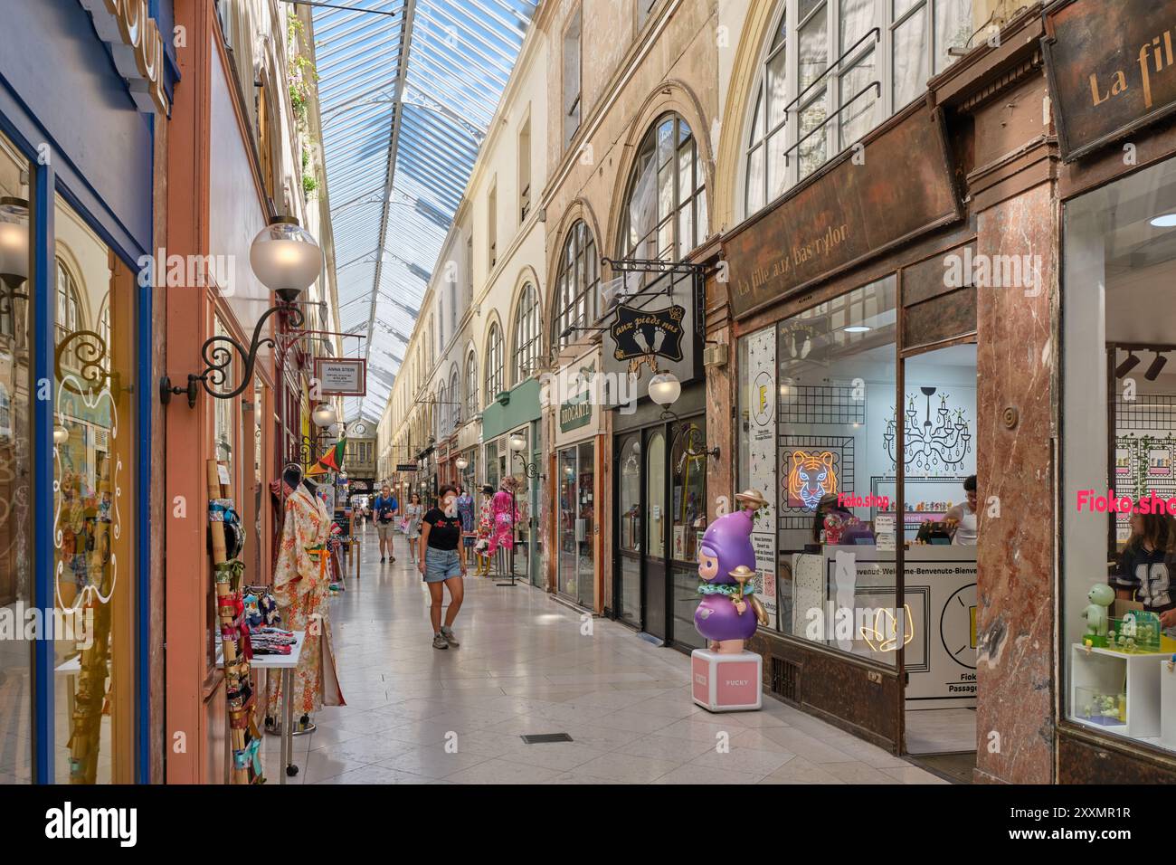 Il Passage Choiseul copriva la galleria di negozi e ristoranti nel quartiere dell'Opera di Parigi, secondo arrondissement Foto Stock