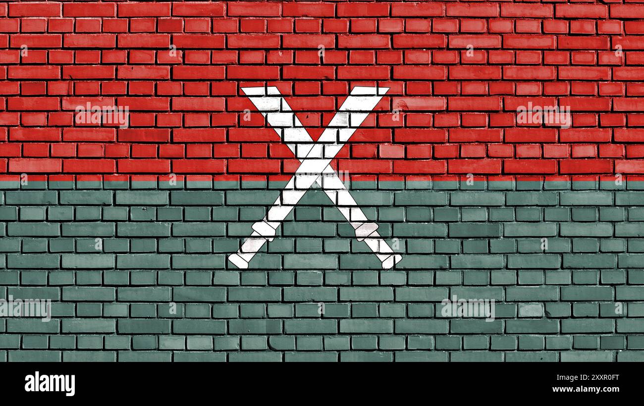 Bandiera dell'esercito dell'indipendenza di Kachin dipinta su un muro di mattoni Foto Stock