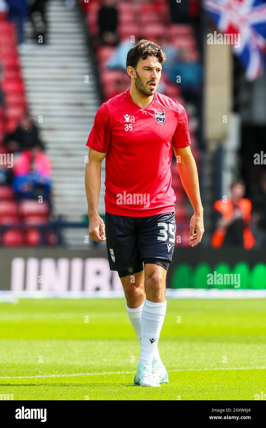 WILL NIGHTINGALE, giocatore di football professionistico, che gioca per il Ross County FC. Immagine acquisita durante una sessione di allenamento e di riscaldamento pre-partita. Foto Stock