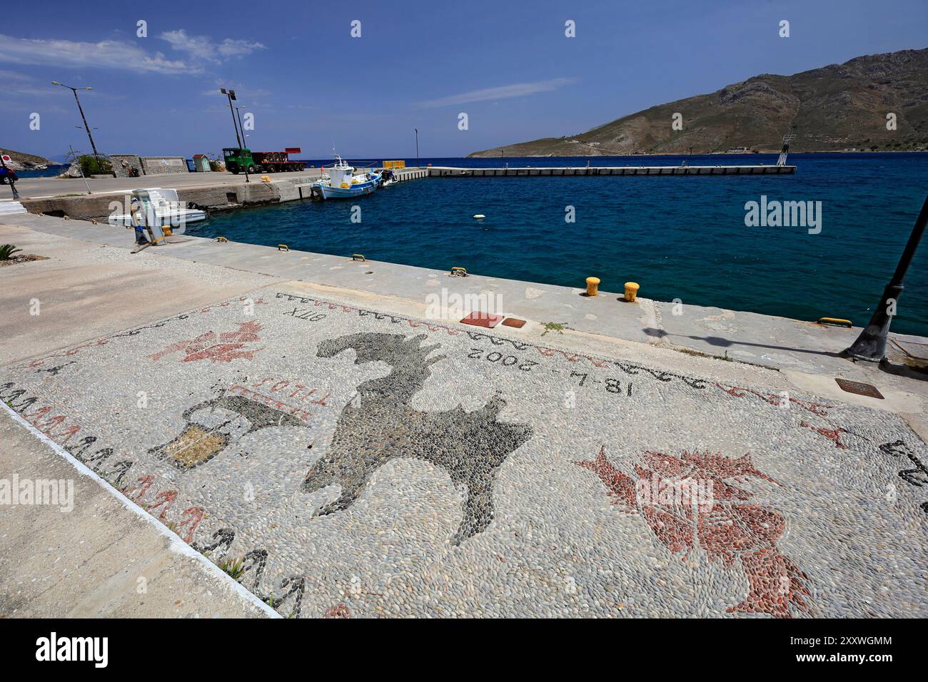 Il porto, l'isola di Tilos, le isole del Dodecaneso, la Grecia. Foto Stock