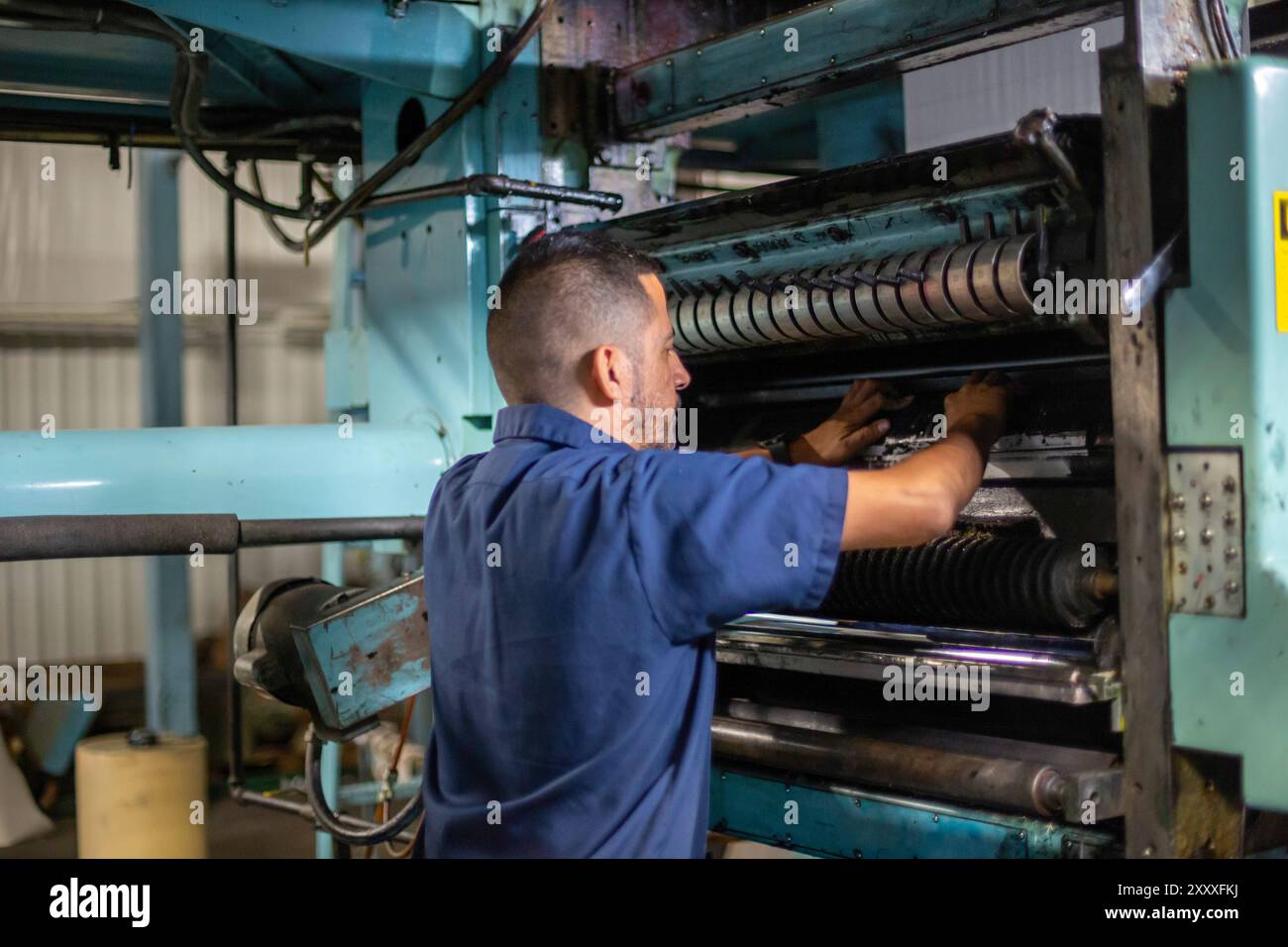 Liberal, Kansas - Danny Moura crea la tipografia al leader & Times. Oltre al proprio giornale, l'azienda stampa settimanalmente giornali comunitari Foto Stock
